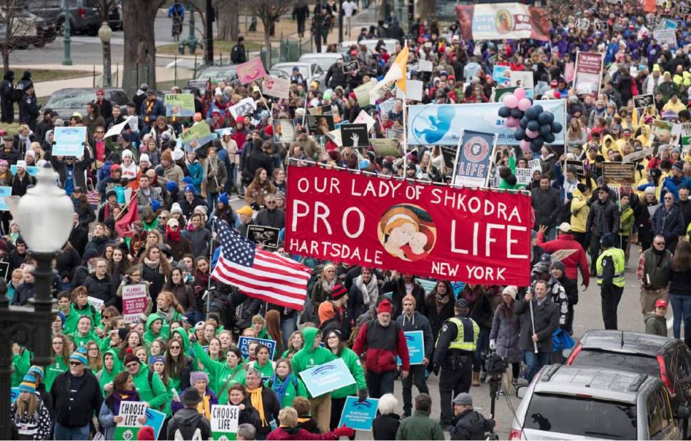Anti-abortion demonstrators arrive on Capitol Hill in Washington, Friday, Jan. 27, 2017, during the March for Life. The march, held each year in the Washington marks the anniversary of the 1973 Supreme Court decision legalizing abortion. (AP Photo/J. Scott Applewhite)