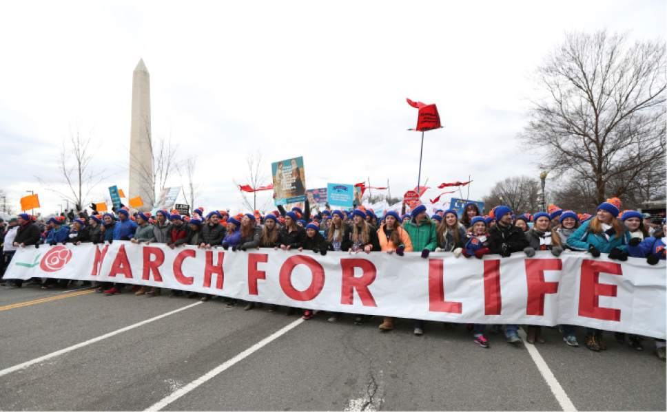 Participants in the March for Life march near the National Mall in Washington, Friday, Jan. 27, 2017. (AP Photo/Manuel Balce Ceneta)