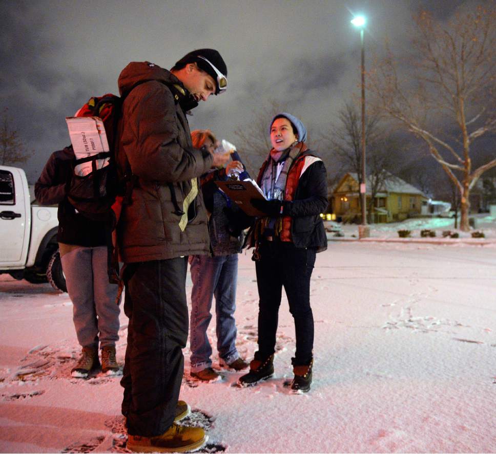 Al Hartmann  |  The Salt Lake Tribune
Volunteers set out at 4 a.m. Thursday Jan. 26 to search for homeless people on the streets for the Point-in-Time Homeless Count. Iosefa Johnson, left, who says that he's been homeless since twelve is interviewed by volunteer Nikki Africano. 
Volunteers of America partners with Utah State Community Services Office and the Salt Lake County conducted the annual survey to count unsheltered individuals suffering from homelessness.