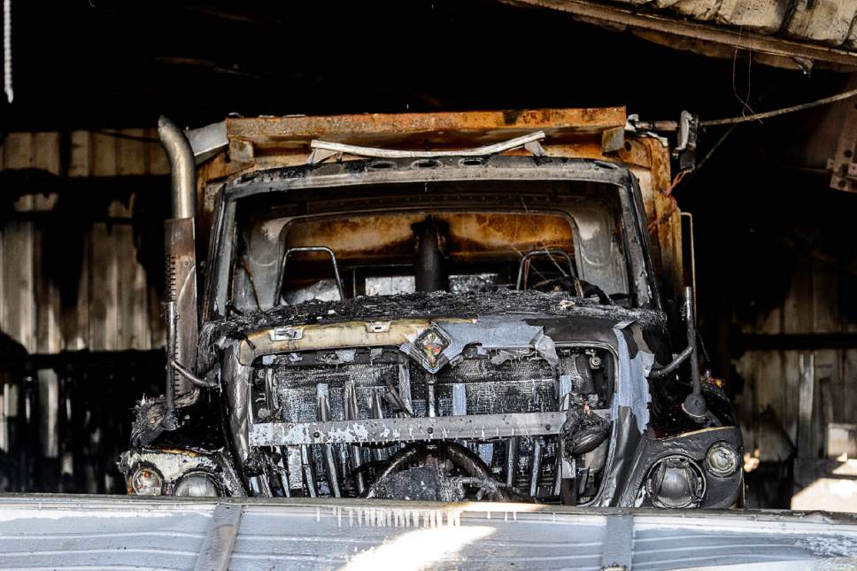 Trent Nelson  |  The Salt Lake Tribune
A fire at Sandy's public works maintenance complex destroyed half of the city's snowplow truck fleet and caused millions of dollars in losses before being extinguished on Friday.