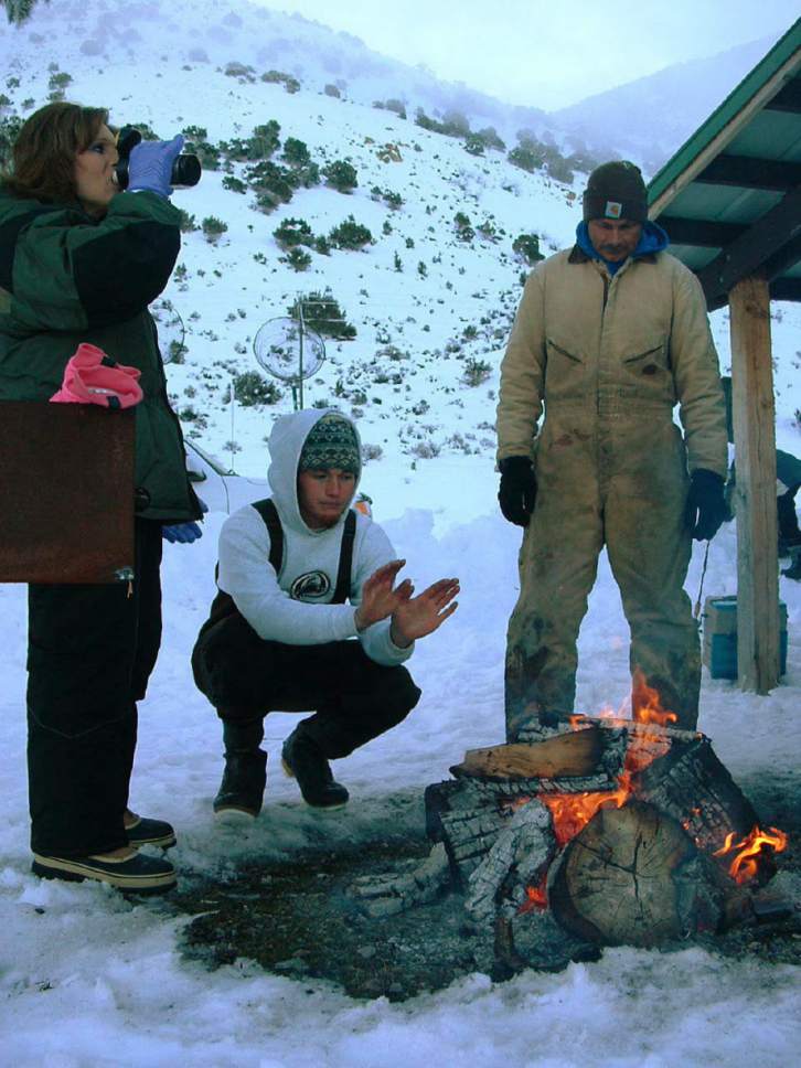 Arrin Newton Brunson  |  Tribune File Photo

Fishermen and their friends gather around the fire at the annual Cisco Disco,  named for the hopping around fish dippers do to stay warm.  Cisco fish are spawning this week and can be netted on the east side of Bear Lake along the rocky shoreline.