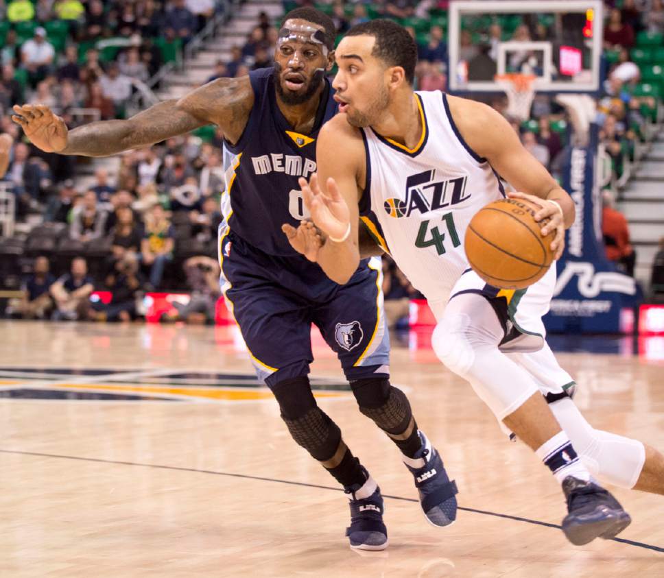 Lennie Mahler  |  The Salt Lake Tribune

Trey Lyles drives past JaMychal Green in a game against the Memphis Grizzlies on Saturday, Jan. 28, 2017, at Vivint Smart Home Arena in Salt Lake City.