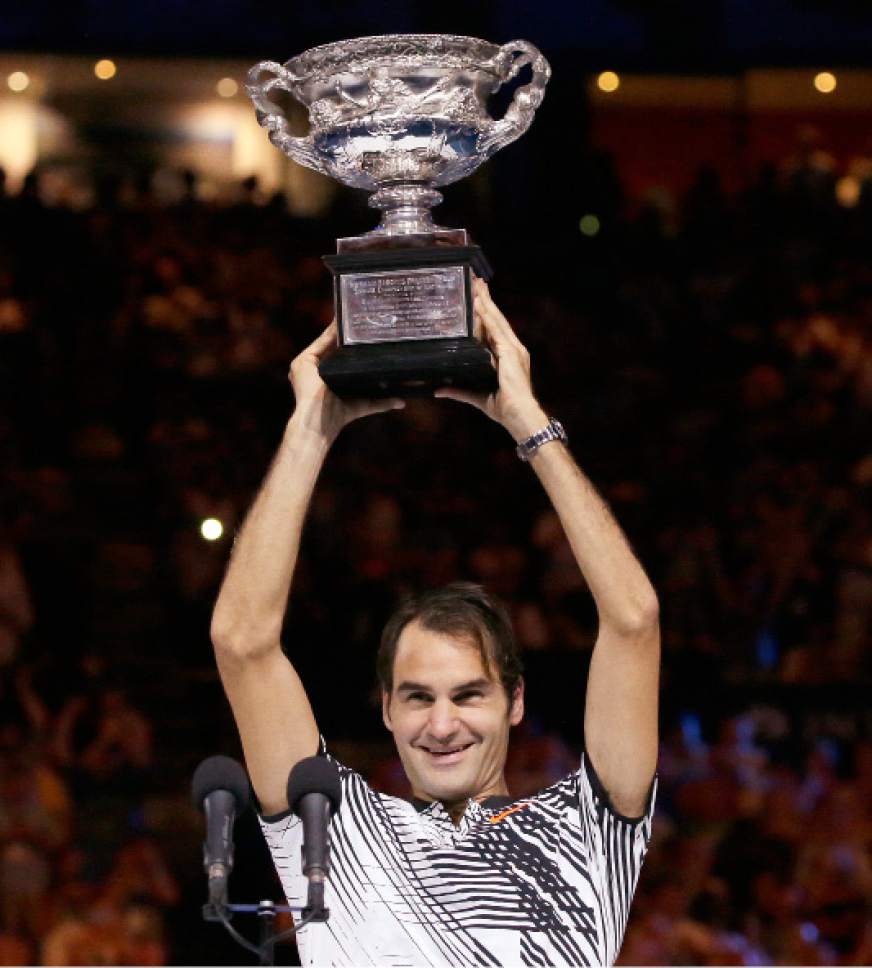 Tennis: Federer beats Nadal in epic Aussie final to win 18th major