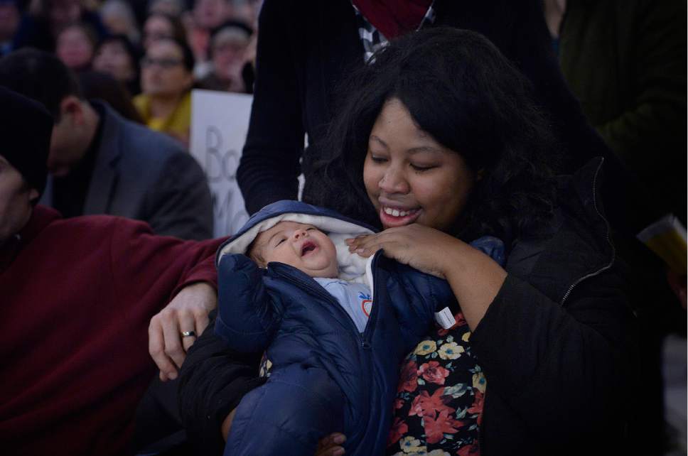 Scott Sommerdorf   |  The Salt Lake Tribune  
Speaker Bryonna Jones holds her son, Michael after she spoke at the gathering after the "March 4 Life Utah" in the Hall of Governors at the Utah State Capitol, Saturday, January 28, 2017. Jones explained that she chose to deliver her baby despite suggestions that she have an abortion.