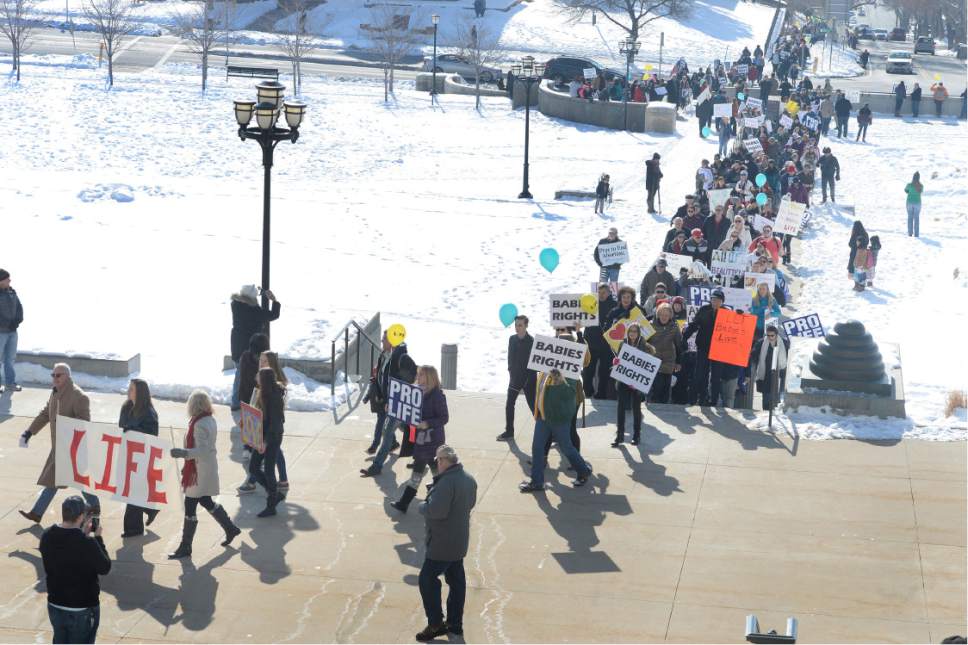 Scott Sommerdorf   |  The Salt Lake Tribune  
The "March 4 Life Utah" organized by Pro Life Utah, arrives at the Utah State Capitol, Saturday, January 28, 2017. They marched from the City and County Building to the Hall of Governors at the Capitol.