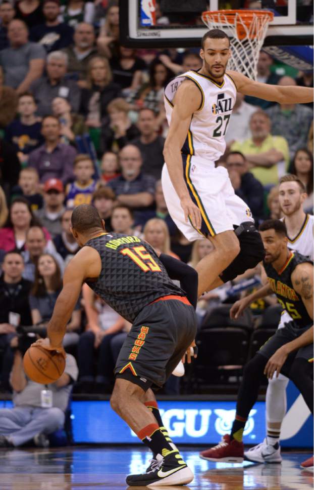 Steve Griffin  |  The Salt Lake Tribune


Utah Jazz center Rudy Gobert (27) gets faked into the air by a Atlanta Hawks center Al Horford (15) pump fake during the Jazz Hawks NBA game at Vivint Smart Home Arena in Salt Lake City, Tuesday, March 8, 2016.