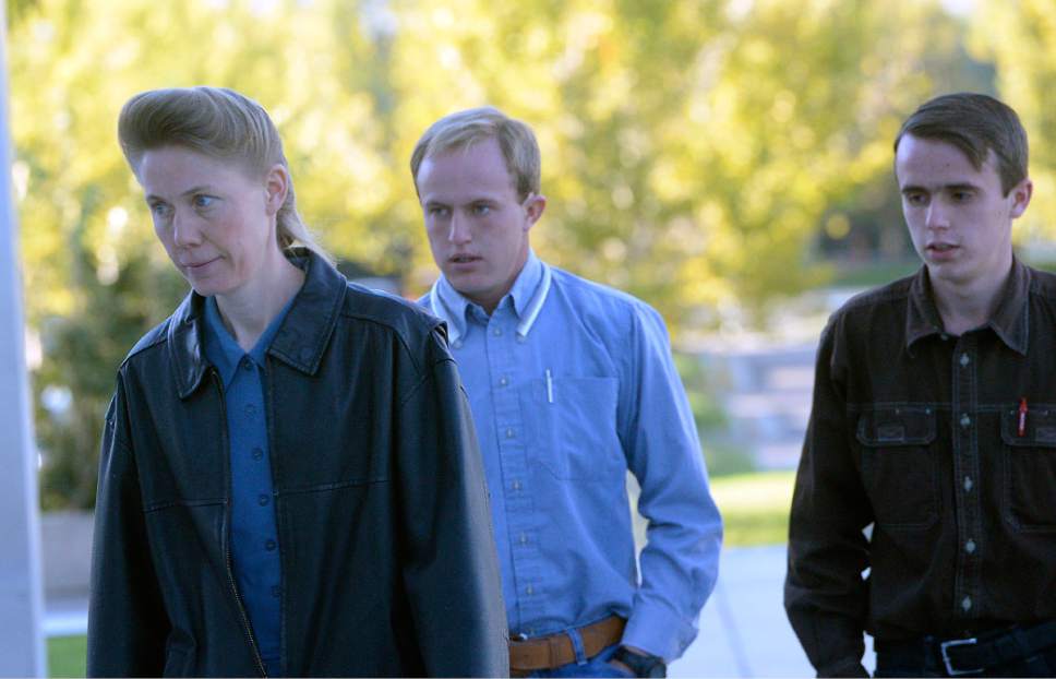Al Hartmann  |  The Salt Lake Tribune
Members of the FLDS Church walk to Federal Court in Salt Lake City Tuesday Oct. 3 for a two-day hearing to hear testimony from FLDS members and government witnesses to determine whether defendants have a religious right to share their food stamp benefits.