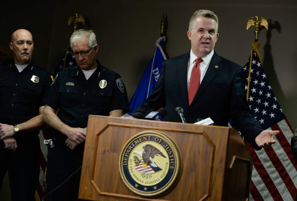 Francisco Kjolseth | The Salt Lake Tribune
U.S. Attorney John Huber, right, leads a press conference about two crime trends: an increases in bank robberies and growing concerns about heroin in Utah. Huber was joined in part by SLC police Chief Mike Brown, far left, and Sheriff Jim Winder, during the press conference at the U.S. Attorney's office in Salt Lake in an effort to bring attention to what was described as a "tsunami" of an increase in heroin use leading to violent crime.