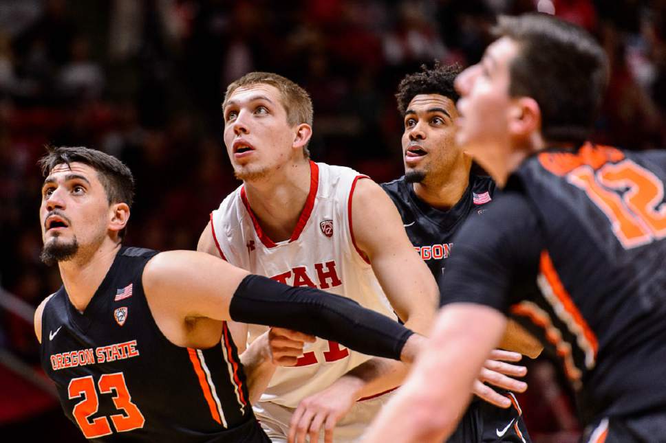 Trent Nelson  |  The Salt Lake Tribune
Oregon State Beavers center Gligorije Rakocevic (23), Utah Utes forward Tyler Rawson (21) and Oregon State Beavers guard Stephen Thompson Jr. (1) look for the rebound on a free throw as the University of Utah hosts Oregon State, NCAA basketball at the Huntsman Center in Salt Lake City, Saturday January 28, 2017. At right is Oregon State Beavers forward Drew Eubanks (12).