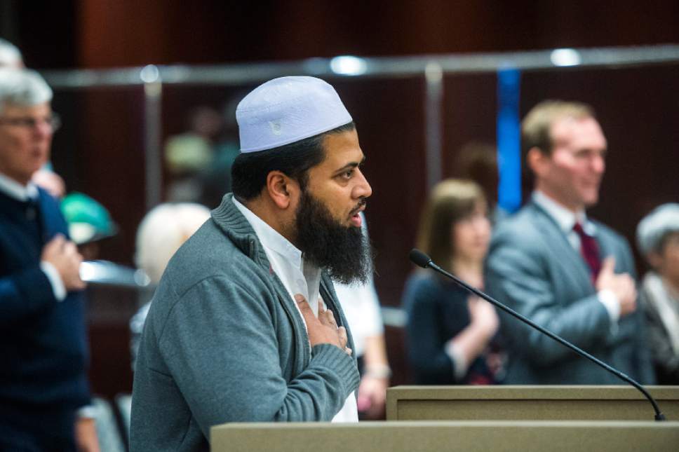Chris Detrick  |  The Salt Lake Tribune
Imam Shuaib Uddin, of the Utah Islamic Center, leads the Pledge of Allegiance before a Salt Lake County Council meeting Tuesday December 15, 2015.
