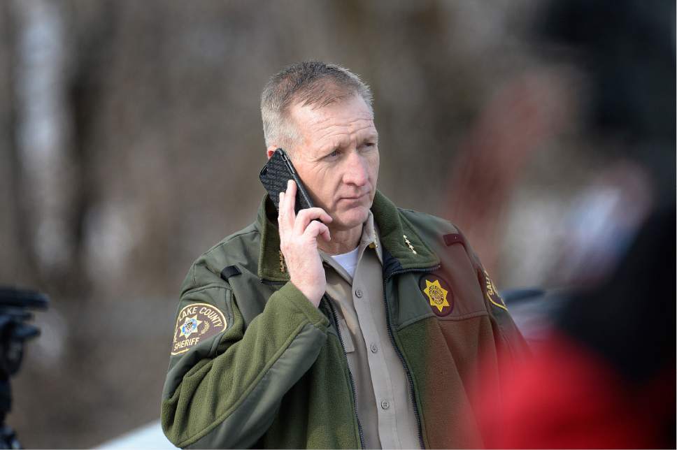 Scott Sommerdorf   |  The Salt Lake Tribune  
Sheriff Jim Winder takes a phone call in the parking lot at Hillcrest High School, Wednesday, February 1, 2017. There were early reports of an active shooter in the school, but it later became apparent the reports were a hoax.