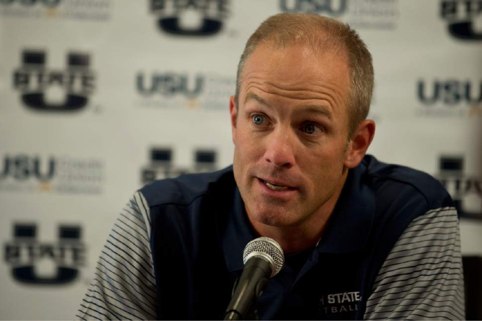 Lennie Mahler  |  The Salt Lake Tribune

Utah State University head football coach Matt Wells answers questions during media day in Logan, Utah, Thursday, Aug. 4, 2016.
