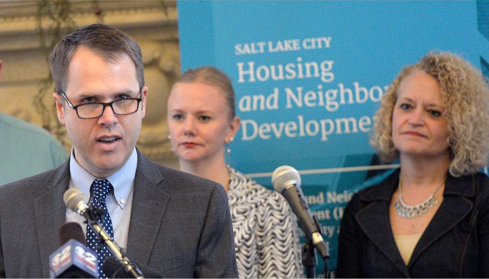 Al Hartmann  |  The Salt Lake Tribune
Mike Akerlow, Deputy Director of Community and Neighborhoods, left, new Housing Director Melissa Jensen and Mayor Jackie Biskupski speak at announcement of Salt Lake Cityís first affordable housing plan in 16 years, ìGrowing SLC: A Five-Year Plan 2017 ñ 2021.î The plan is designed to fundamentally shift the way housing is done in Salt Lake City, strategically addressing short- and long-term housing solutions.