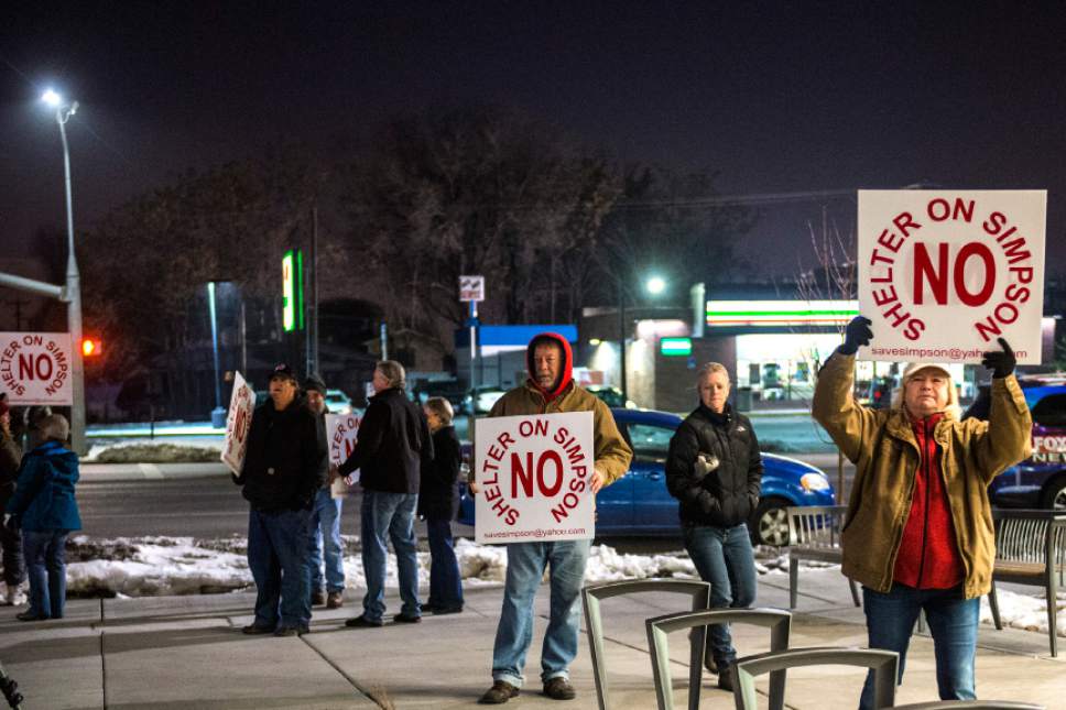 Chris Detrick  |  The Salt Lake Tribune
Protesters demonstrate before Salt Lake City Mayor Jackie Biskupski delivers the 2017 State of the City address at the Marmalade Library Tuesday January 31, 2017.