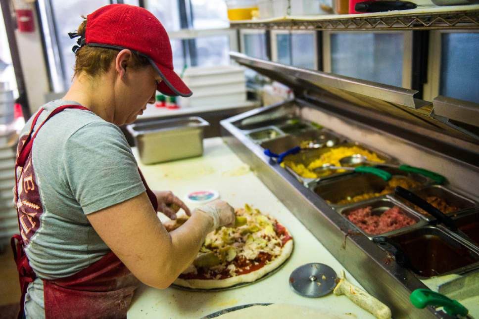 Chris Detrick  |  The Salt Lake Tribune
Cook Maria Del Pilar Henao makes a pizza at The Pie Pizzeria in Salt Lake City Friday February 3, 2017.