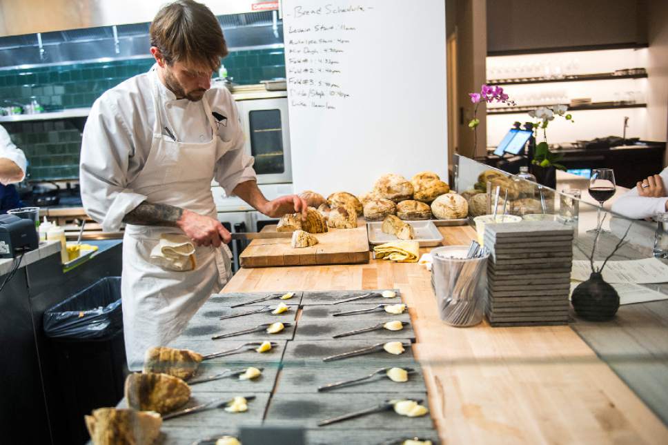 Chris Detrick  |  The Salt Lake Tribune
Chef and co-owner Nick Fahs, slices house-made bread at Table X Friday January 27, 2017.