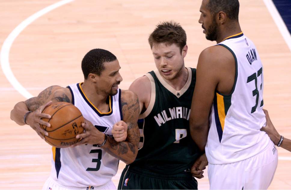 Steve Griffin / The Salt Lake Tribune

Utah Jazz guard George Hill (3) and Milwaukee Bucks guard Matthew Dellavedova (8) get tangled up during NBA game at Vivint Smart Home Arena in Salt Lake City Wednesday February 1, 2017.