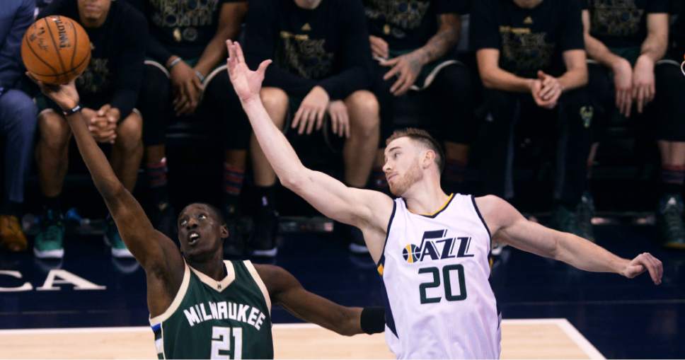 Steve Griffin / The Salt Lake Tribune

Milwaukee Bucks guard Tony Snell (21) grabs a rebound over the outstretched arms of Utah Jazz forward Gordon Hayward (20) during NBA game at Vivint Smart Home Arena in Salt Lake City Wednesday February 1, 2017.