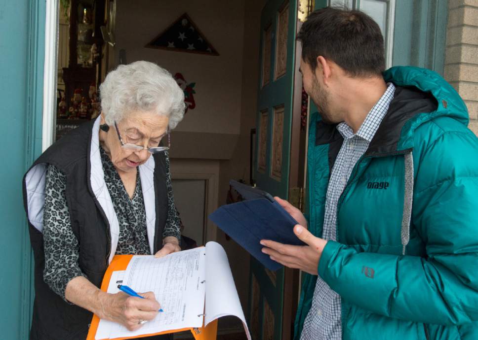 Rick Egan  |  Tribune file photo

Tanner Leatham gets a signature from Connie Swenson, for Sen. Curt Bramble, R-Provo, at her home in Provo in January.Bramble faces a June 28 primary challenge from Chris Herrod, which some believe was due to delegate backlash over SB54, which he sponsored.