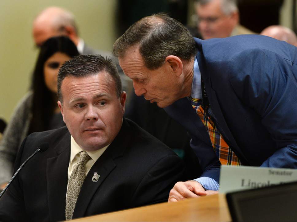 Steve Griffin / The Salt Lake Tribune

Brad Dee, Utah Communications Authority legislative liaison, right, talks with Utah Communications Authority executive director David Edmunds, during the Executive Offices and Criminal Justice Appropriations Subcommittee meeting in the House Building Room 25, on Capitol Hill in Salt Lake City Thursday February 2, 2017. The communications authority was rocked by a $1 million embezzlement scandal earlier this year.