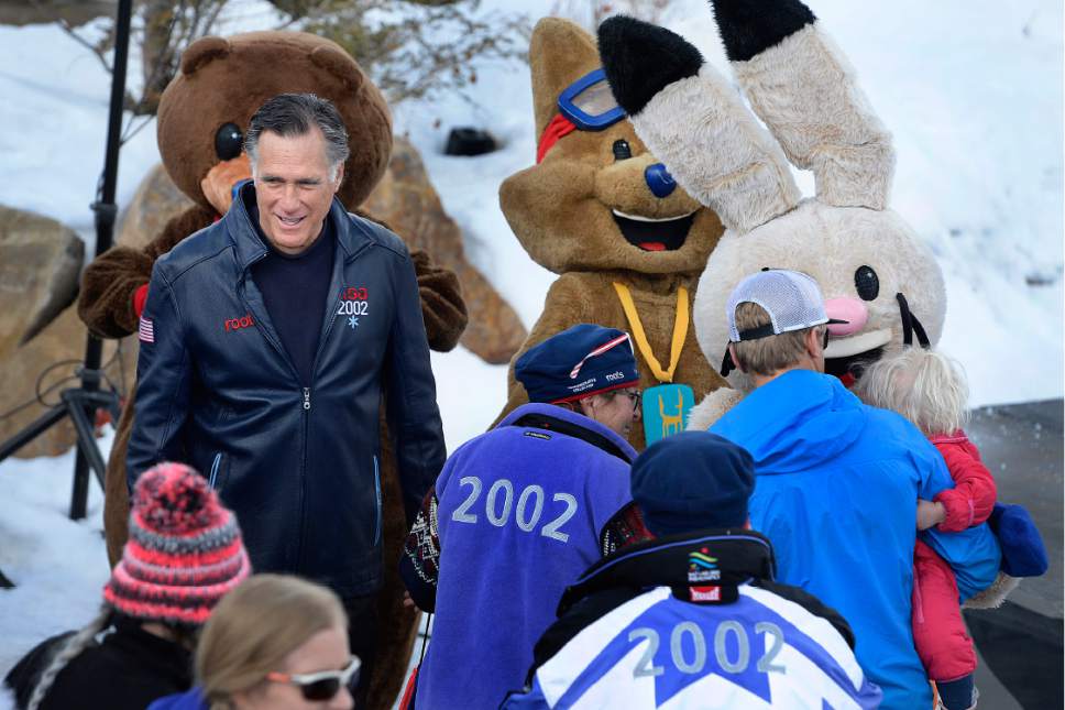 Scott Sommerdorf   |  The Salt Lake Tribune  
Mitt Romney arranges a photo with 2002 Olympic mascots "Copper" "Powder" and "Coal" at the 15th Anniversary of the 2002 Olympic and Paralympic Winter Games at Utah Olympic Park, Soldier Hollow Nordic Center on Saturday.