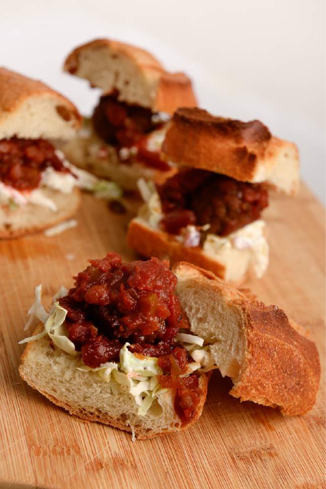 Francisco Kjolseth | The Salt Lake Tribune
Rustic Tomato meatball sliders by Jason and Brittany Moffat, owners of Rustic Tomato Chili Sauce.