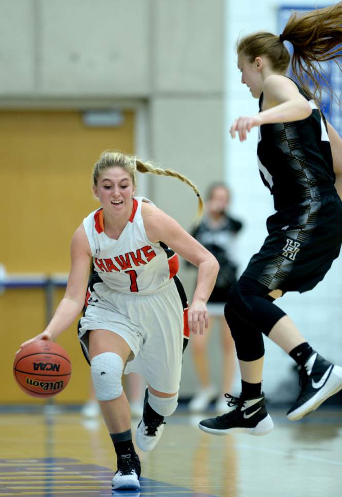 Steve Griffin  |  The Salt Lake Tribune


Alta's Mariah Martin gets Highland's Alex Debow (21)  into the air as she drives the ball during the Highland versus Alta girl's 4A quarter final game at Salt Lake Community College in Salt Lake City, Wednesday, February 24, 2016.