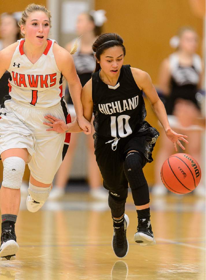 Trent Nelson  |  The Salt Lake Tribune
Highland's Marlee Machon (10) dribbles the ball, defended by Alta's Mariah Martin as Alta faces Highland in a quarterfinals game at the 4A High School Girls Basketball Tournament at Salt Lake Community College in Taylorsville, Wednesday February 24, 2016.