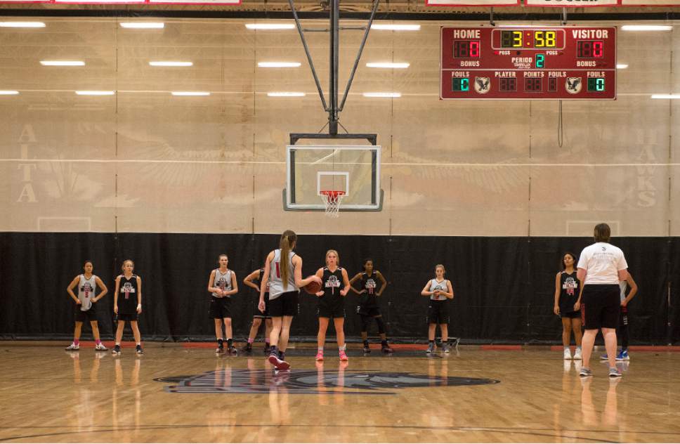 Leah Hogsten  |  The Salt Lake Tribune
Kemery Martin pauses at center court before starting a play during practice Thursday, February 2, 2017. "We're always on the same side of understanding with each other," said sisters Mariah, 17, and Kemery Martin, 16, two of the  leaders on the Alta High School girls' basketball team,Thursday, February 2, 2017.