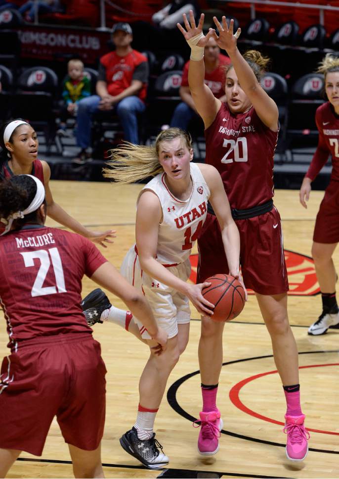 Scott Sommerdorf   |  The Salt Lake Tribune  
Utah Utes guard Paige Crozon (14) spins to try to find a team mate to pass to after her drive was stymied by the Cougar defense. Washington State beat Utah 61-55, Sunday, February 5, 2017.