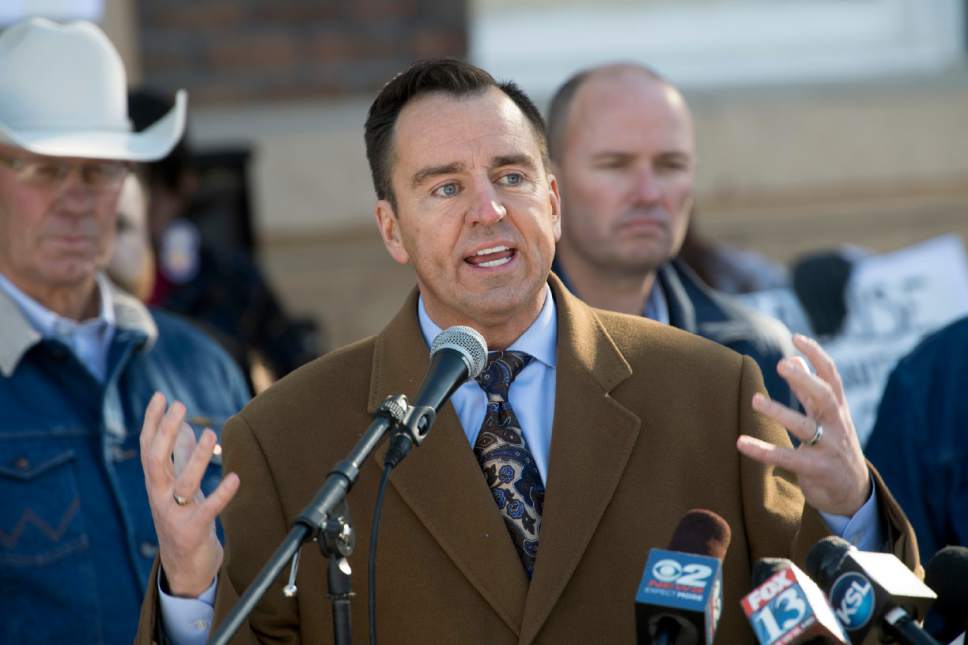 FILE - In this Dec. 29, 2016 file photo, state Rep. Greg Hughes, R-Utah, talks during a protest of the new Bears Ears National Monument in Monticello, Utah. This is Greg Hughes' third session as the speaker of Utah's House of Representatives, a tenure marked by his marshaling of House Republican as they resisted Gov. Gary Herbert's push to expand Medicaid. (Rick Egan/The Salt Lake Tribune via AP, File)