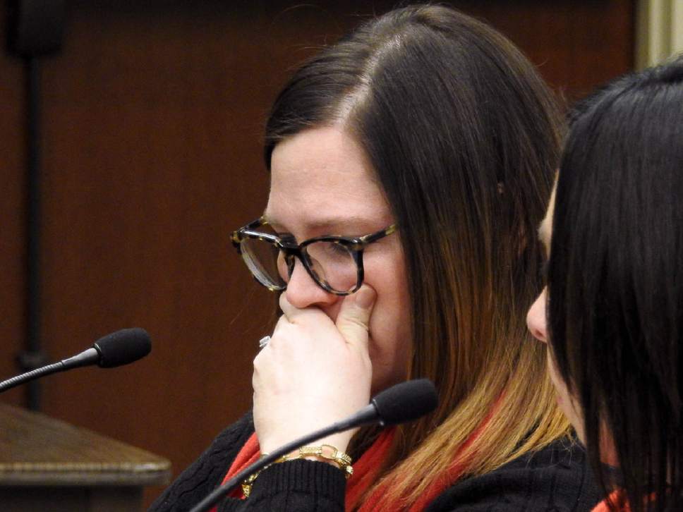 Trent Nelson  |  The Salt Lake Tribune
Alyson Ainscough takes a moment to compose herself while testifying as the House Law Enforcement and Criminal Justice Standing Committee holds a hearing on HB0200, legislation requiring testing of all rape kits, in Salt Lake City, Friday February 3, 2017.