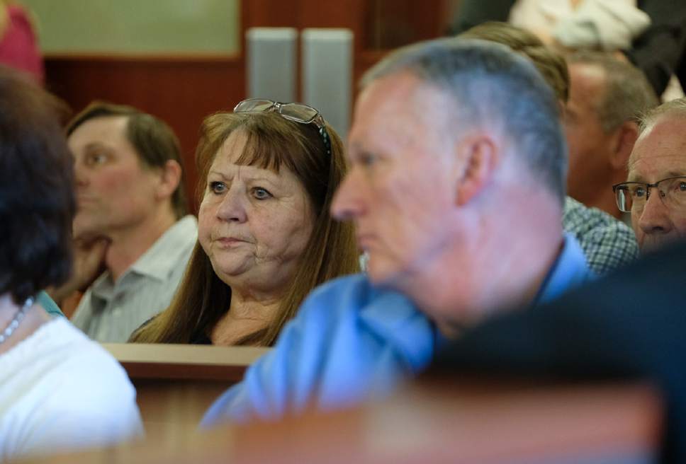 Francisco Kjolseth | The Salt Lake Tribune
Janice Rowberry joins other opponents and supporters of fraudster Dee Randall, who appeared at the Matheson Courthouse for sentencing by 3rd District Judge Mark Kouris on Monday, Feb. 6, 2017. Randall pleaded guilty in July of last year to five charges related to his operation of a Ponzi scheme that took in more than $72 million from about 700 people.