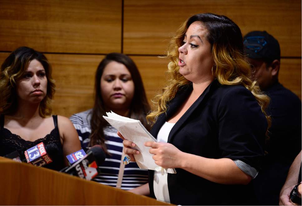 Scott Sommerdorf   |  The Salt Lake Tribune  
Ashley Gustin, Paris Gustin's mother makes a tearful appealon Thursday for anyone with information about his shooting to come forward and help the investigation as she spoke during a news conference.