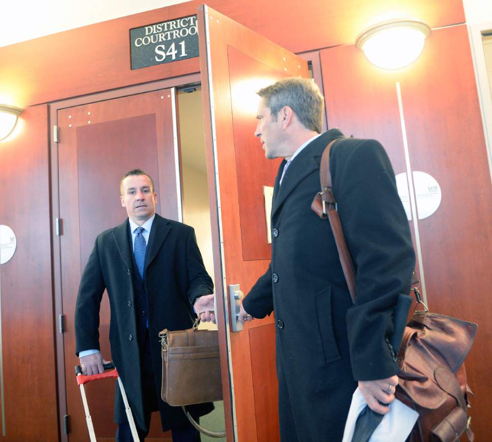 Al Hartmann  |  The Salt Lake Tribune
Defense lawyers Brad Anderson, left, and Scott Williams enter Judge Elizabeth Hruby-MIlls courtroom in Salt Lake City Tuesday Feb. 7 for the first day of jury selection in John Swallow's public corruption trial.
