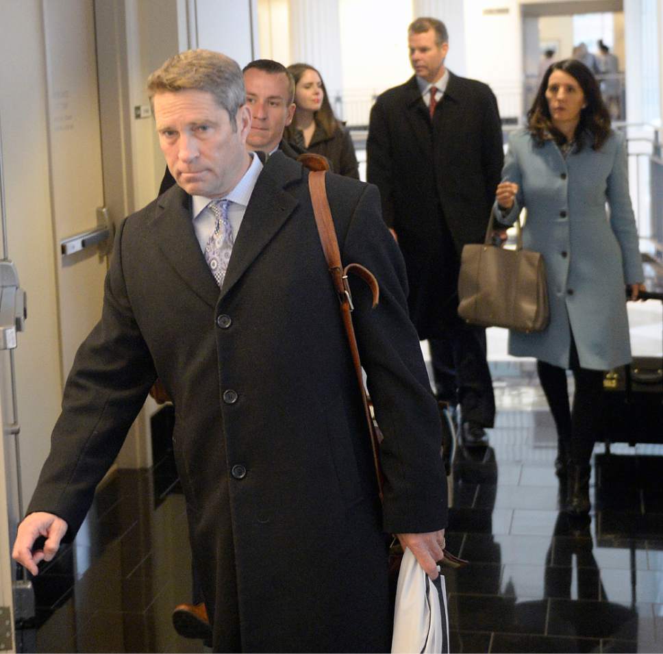 Al Hartmann  |  The Salt Lake Tribune
Defense lawyer Scott Williams leads his team and client John Swallow into Judge Elizabeth Hruby-MIlls courtroom in Salt Lake City for jury selection for the Swallow's public corruption trial Tuesday Feb. 7.