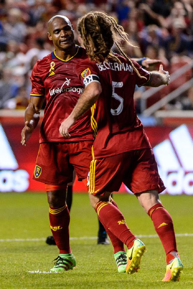 Trent Nelson  |  The Salt Lake Tribune
Real Salt Lake defender Jamison Olave (4) gets a high-five from teammate Kyle Beckerman (5) after a near-miss on goal as Real Salt Lake hosts the Houston Dynamo, Saturday September 17, 2016.