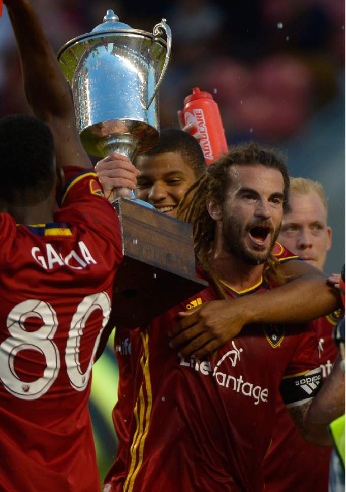 Leah Hogsten  |  The Salt Lake Tribune
On the night Real Salt Lake won the Rocky Mountain Cup,in the 88th minute, Real Salt Lake midfielder Kyle Beckerman became the all time minutes played leader in MLS history. Real Salt Lake defeated the Colorado Rapids 2-1 during their Rocky Mountain Championship Cup game at Rio Tinto Stadium Friday, August 26, 2016.