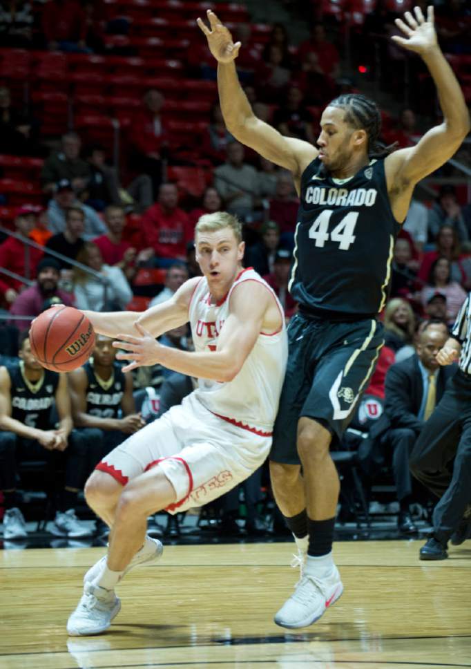 Lennie Mahler  |  The Salt Lake Tribune

Utah guard Parker Van Dyke drives past Colorado's Josh Fortune in the first half of a game against the Colorado Buffaloes on Sunday, Jan. 1, 2017, at the Huntsman Center in Salt Lake City.