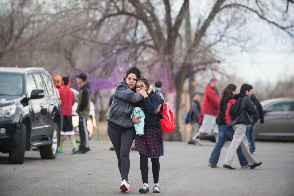 Lennie Mahler  |  The Salt Lake Tribune
Claudia Onofre reunites with her daughter, Karina, on Thursday after police secured American Preparatory Academy in West Valley City. Police investigated after reports of a man with a firearm.