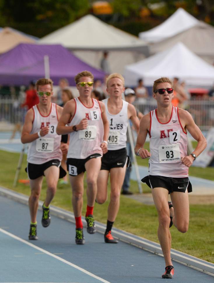 Francisco Kjolseth | The Salt Lake Tribune 
Casey Clinger of American Fork pulls ahead early in the Boy's 3200 meter race and stays there for a win with a time of 9.02.58 at the BYU Invitational Track and Field meet on Friday, May 6, 2016. Followed in close pursuit are teammates Patrick Parker #89 who took second and McKay Johns #87 who took fourth. In third place was William Handley #405 of Timpanogos.