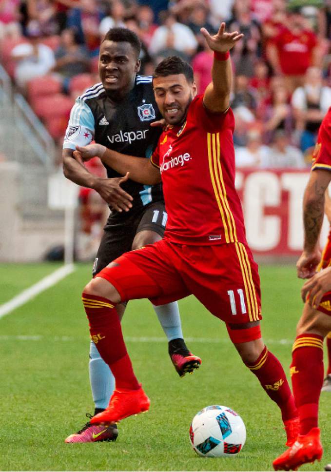 Michael Mangum  |  Special to the Tribune

Real Salt Lake midfielder Javier Morales (11) and Chicago Fire defender Brandon Vincent (3) battle for possession during their MLS match at Rio Tinto Stadium in Sandy, Utah on Saturday, August 6th, 2016.