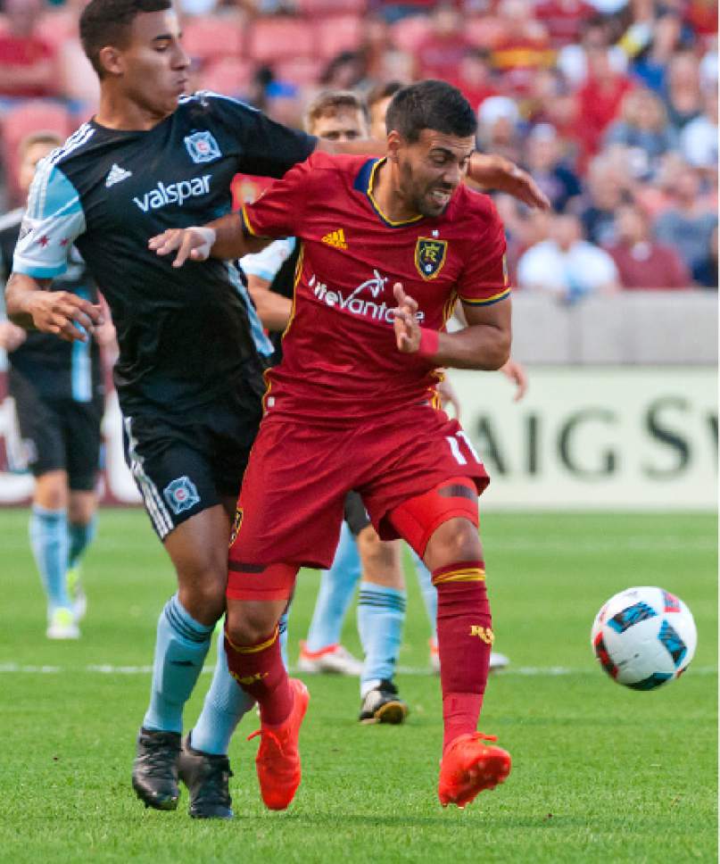 Michael Mangum  |  Special to the Tribune

Real Salt Lake midfielder Javier Morales (11) shields the ball from Chicago Fire defender Brandon Vincent (3) during their MLS match at Rio Tinto Stadium in Sandy, Utah on Saturday, August 6th, 2016.