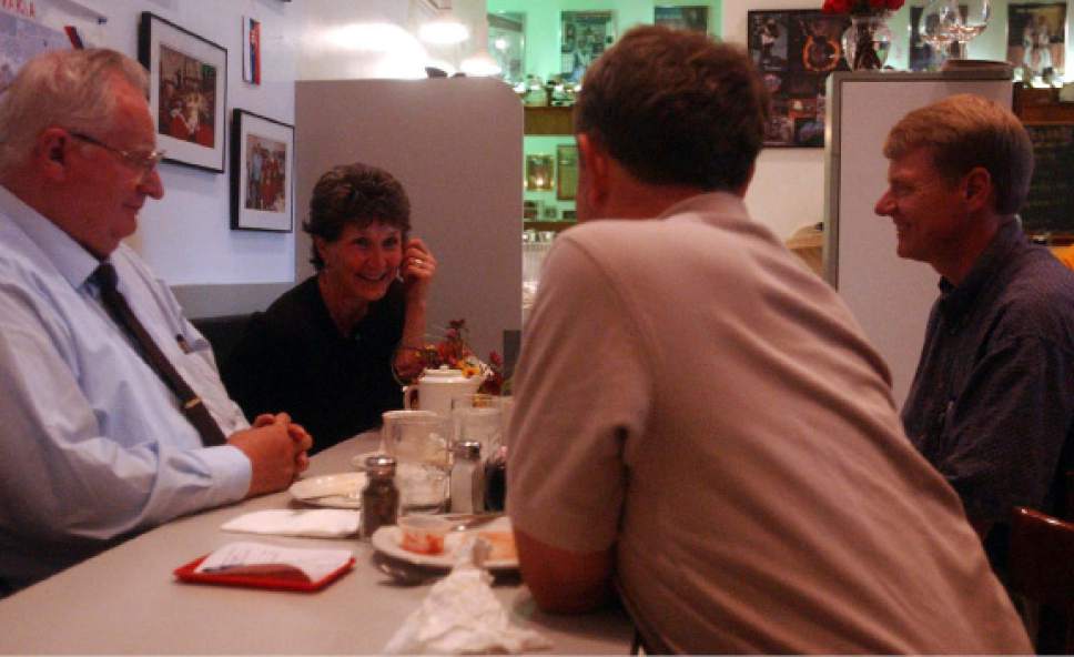 Leah Hogsten  |  Tribune file photo

Carole Couch, then owner of Judge Cafe, talks with regulars at the restaurant in this 2003 photo.