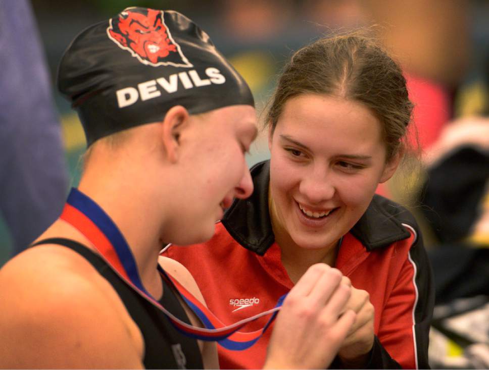 Leah Hogsten  |  The Salt Lake Tribune
Grand County High School swimmer Corri Kause (right) tries to cheer up a tearful London Richards (left) who took 4th in the 100yd butterfly at the 2A State Swimming Championships at the Brigham Young University Pool in Provo, February 9, 2017.