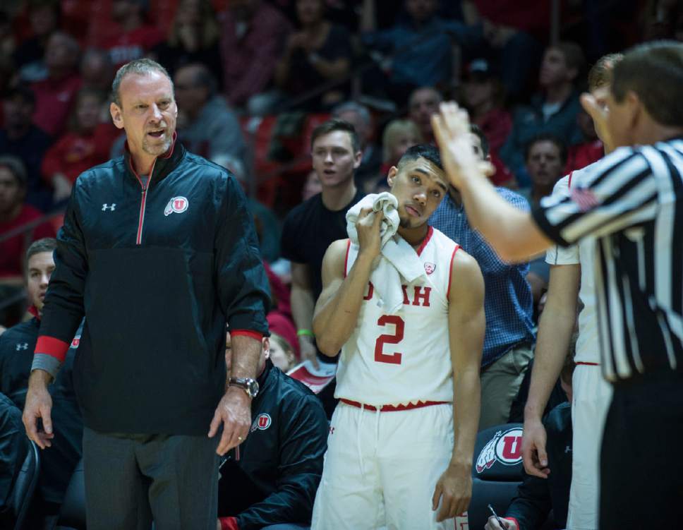 Lennie Mahler  |  The Salt Lake Tribune

Utah head coach Larry Krystkowiak and Sedrick Barefield look at an official in disbelief after an offensive foul call during a game between Utah and Washington State at the Huntsman Center in Salt Lake City, Thursday, Feb. 9, 2017.