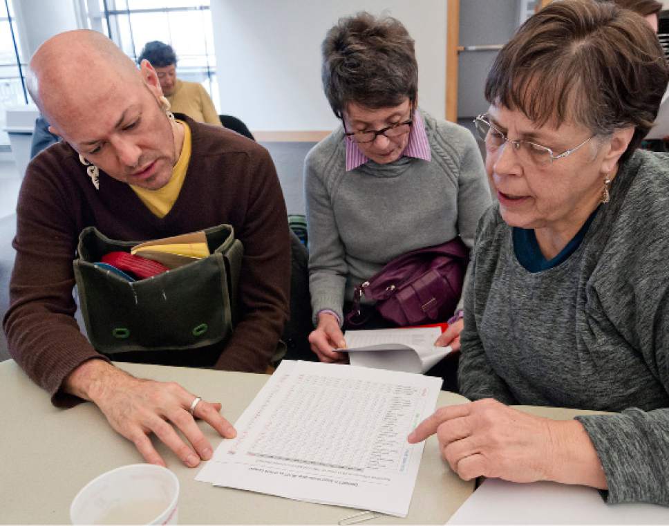 Michael Mangum  |  Special to the Tribune

Benjamin Spears from Salt Lake, left, Kate Wright from Holladay, center, and Susan Bowlden from South Salt Lake participate in an activity aimed at training people in reading and sharing statistics accurately and appropriately during a Writing for Change event at the Salt Lake City Public Library on Saturday, Feb. 4, 2017. "I want to try and figure out how to 'un-fake' my news," Bowlden said of her decision to attend these events.