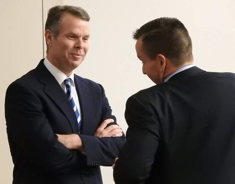 Rick Egan  |  The Salt Lake Tribune

John Swallow talks with Brad Anderson from his defense team, during a recess in  his trial in Judge Elizabeth Hruby-Mills courtroom in Salt Lake City, Thursday, February 9, 2017.