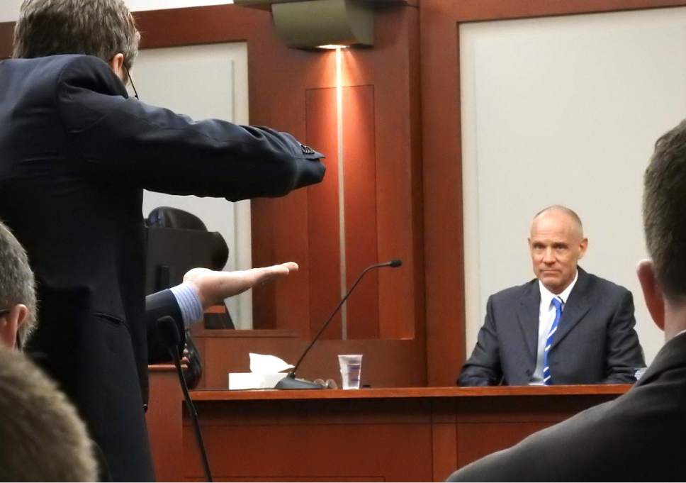 Rick Egan  |  The Salt Lake Tribune

Scott Williams cross-examines witness Marc Sessions Jenson, during the trial of former Utah Attorney General John Swallow at Matheson Courthouse, Thursday, February 9, 2017.