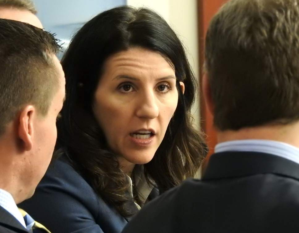 Rick Egan  |  The Salt Lake Tribune

Cara Tangaro, discusses an issue with Brad Anderson and Scott Williams, members of John Swallow's defense team, in Judge Elizabeth Hruby-Mills courtroom in Salt Lake City, Thursday, February 9, 2017.